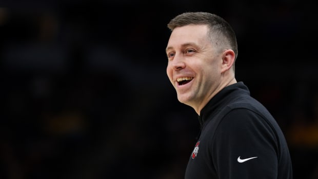 Mar 14, 2024; Minneapolis, MN, USA; Ohio State Buckeyes interim head coach Jake Diebler reacts during the first half against the Iowa Hawkeyes at Target Center.